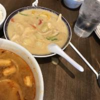Yellow Curry · Potatoes, bell peppers, bamboo, and onions, settle yet addicting taste, your choice of chick...