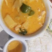 Red Curry · Bamboo, onions, basil, and potatoes, the mother of all curries, your choice of chicken, beef...