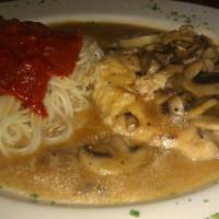 Chicken Marsala · Sauteed chicken breast with fresh mushrooms in Marsala wine sauce and a touch of marinara sa...