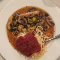 Chicken Murphy · Sauteed chicken breast with artichoke hearts, hot peppers and mushrooms in a sherry wine sau...