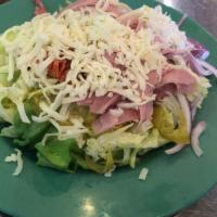 Antipasto Salad · Our garden salad dressed with salami, ham and pepperoni.