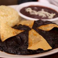 Mole Poblano · Chicken breast covered in a homemade sweet and spicy mole sauce served with rice and beans. ...