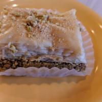 Baklava · Flaky organic filo dough layered and topped with your choice of Hazelnut Coconut, Pistachio ...