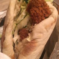 Falafel Sandwich · Original hummus, our exclusive falafel made from scratch, served on our house pita bread, to...
