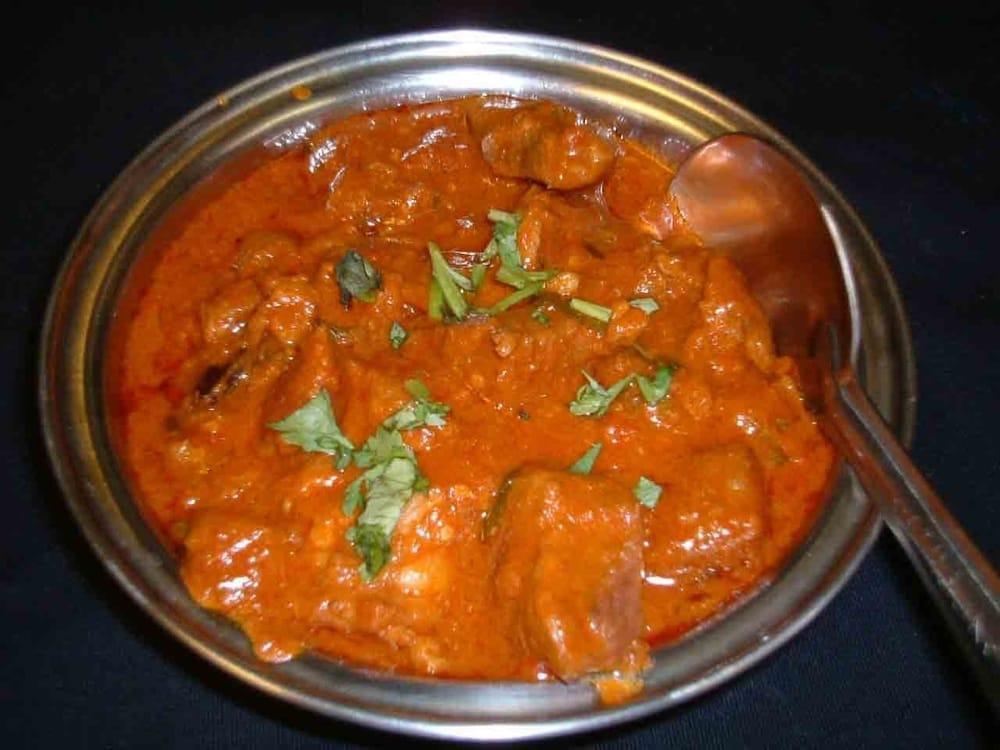 Chicken Tikka Masala Combo · Chunks of chicken cooked in tomato & creamy sauce. Served with naan, rice & salad.