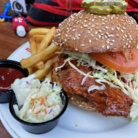 Nashville Hot Chicken Sandwich · buttermilk fried chicken, hot sauce, pickles, coleslaw, mayo, sesame seed bun
