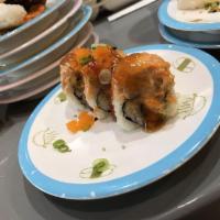 Fire Roll · Spicy salmon and avocado inside. Baked with spicy salmon. 
 3 Pieces.
