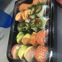 Oregon Roll · Crab salad and cucumber. Topped with salmon and avocado.  
4 Pieces