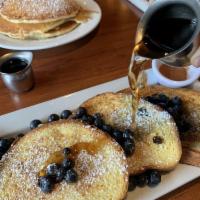 French Toast · We are famous for an amazing artisanal brioche bread dipped in our homemade creme anglaise a...