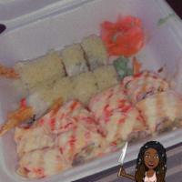 Wasabi Roll · Shrimp tempura, crab slick top with crunchy, wasabi sauce.