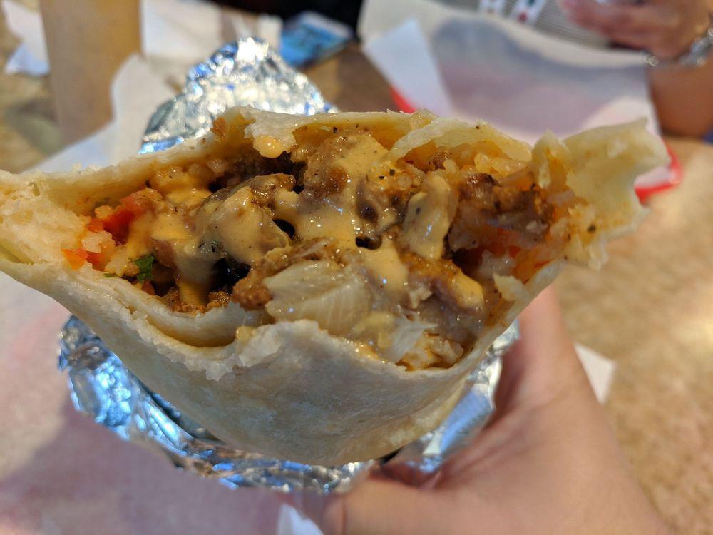 Regular Burrito · Whole Beans, rice, fresh salsa, and choice of meat.
