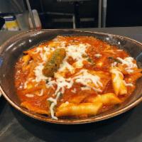 Tteokbokki · Rice cakes and fish cakes simmered with scallions and onion in
Bonchon Hot Sauce topped with...