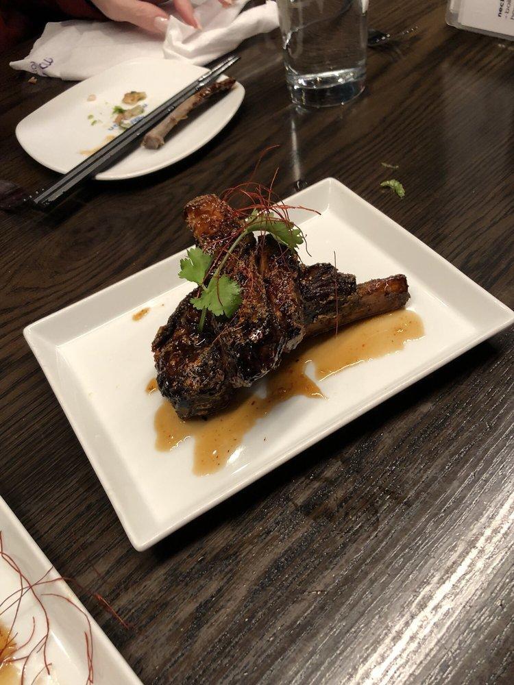 Sticky Ribs · Twice cooked pork ribs with hoisin chili