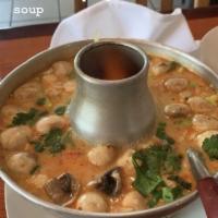 Tom Kha Soup · Coconut soup with mushroom, lemongrass, kaffir lime leaves, galangal, onion, tomatoes and ci...