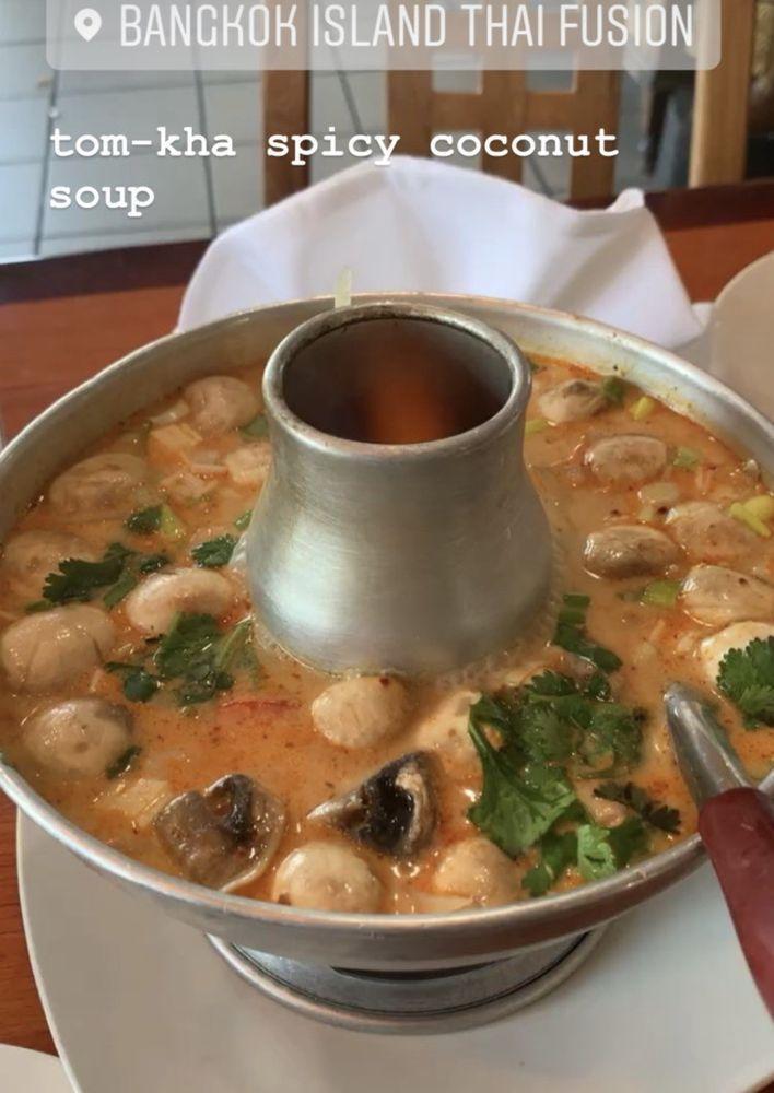 Tom Kha Soup · Coconut soup with mushroom, lemongrass, kaffir lime leaves, galangal, onion, tomatoes and cilantro.
