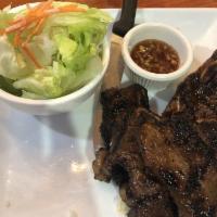Grilled Short Ribs · Served with steamed rice and salad.