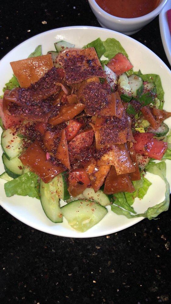 Fattoush Salad · Traditional salad mixed with fried pita.
