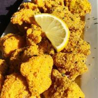 Catfish Nuggets · Golden delights that melt in your mouth.