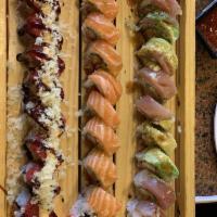 Del Mar Roll · Inside : spicy tuna, avocado and shrimp tempura. Outside : salmon with Gami sauce.