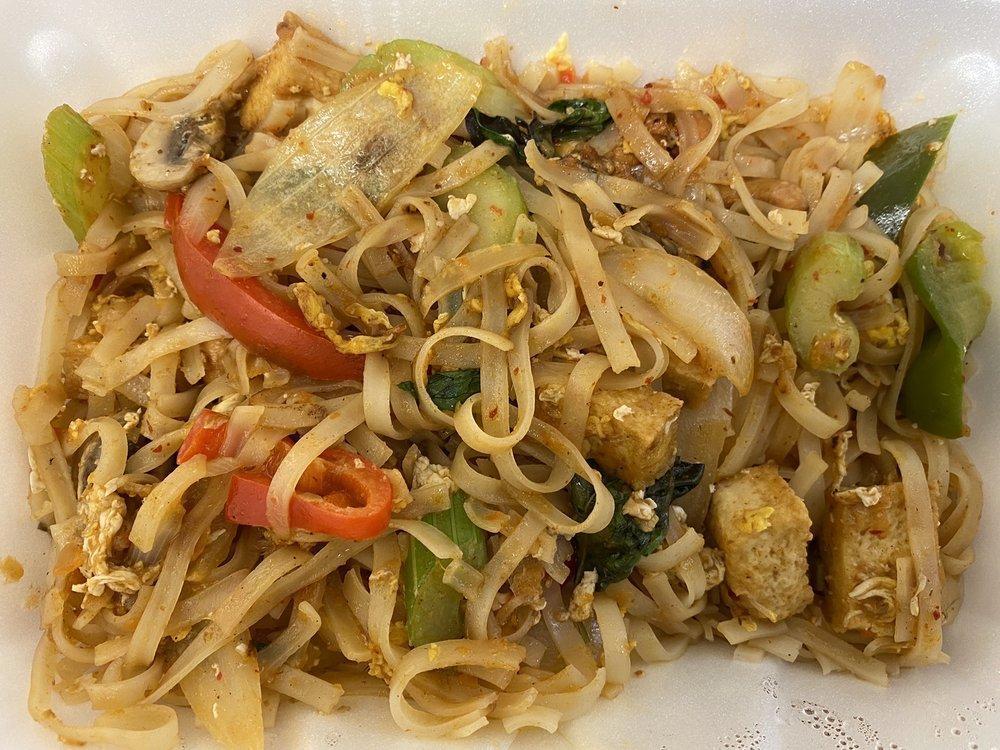 Drunken Noodles · Sauteed rice noodles with egg, celery, onion, sweet pepper, mushroom and cashews with holy basil. Spicy.