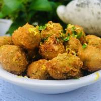 Fried Olives · Stuffed with white anchovies, lemon zest.