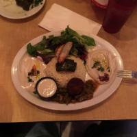 Vegetarian Plate · Sampler with hummus, baba ghanouj, garden salad, rice, green beans, 1 falafel patty, 1 grape...