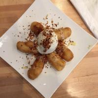 Fried Bananas · Come with dulce de leche. Add a scoop of ice cream for an additional charge.