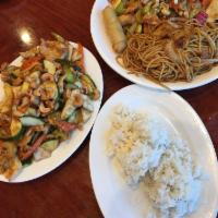 Cashew Chicken · Tender chicken, breast with celery, carrots, zucchini and water chestnuts in brown sauce top...