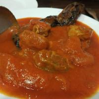 Bademjoun · Eggplant stew made with plum tomatoes, onions, and braised veal.