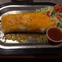 Shredded Beef Burrito · Slow roasted beef brisket, marinated in signature spices, wrapped in a flour tortilla topped...
