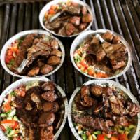 Mixed Grill · A rich combination platter of shish kebab, lamb gyro, adana kebab and lamb chops grilled to ...