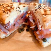 The New Yorker Sandwich · Smoked salmon, cream cheese, onions, capers on a bagel