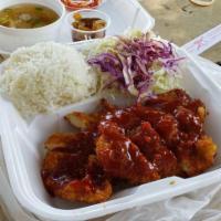 Spicy Chicken Katsu · Chicken tender cutlet with spicy sauce. Served with rice, miso soup and cabbage salad.