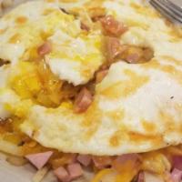 Red Truck Skillet · 3 farm fresh eggs on top of home fries or hash-browns, cheddar cheese, diced ham, and sautee...