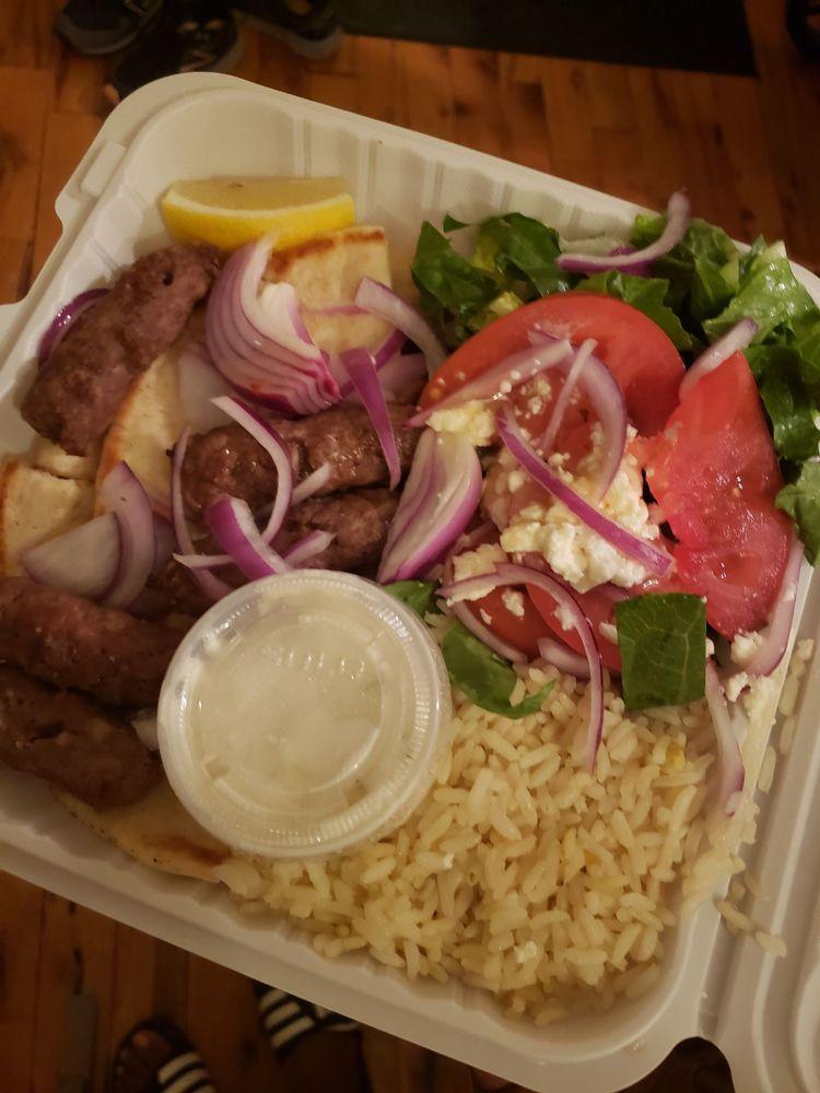 Qofte · Charbroiled beef mixed with lamb, served with tzatziki.