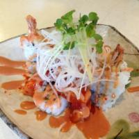 Tuna Volcano Roll · Prawn tempura, spicy tuna, daikon radish, shiso flakes and special aioli.