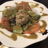 Tuna Salad · Lettuce, tomatoes, onions, cucumbers & tuna.
