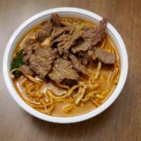 Khao Soi · Thai northern style curry noodle soup with coconut milk curry, egg noodle, bean sprout, red ...