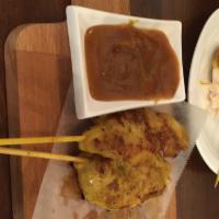Chicken Satay · 4 pieces. BBQ of marinated chicken in coconut milk on skewers served with specially prepared...