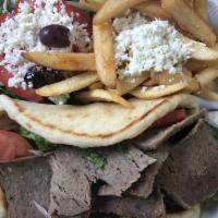 Gyros Plate · The best gyros meat in town with all the trimmings. Choice of 2 side dishes: Greek salad, ri...