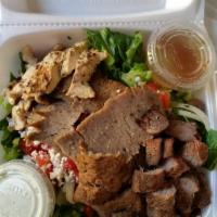 Santorini Cobb Salad · Greek salad, topped with 3 meats. Gyros, chicken and beef. Island crafted salad. Served with...