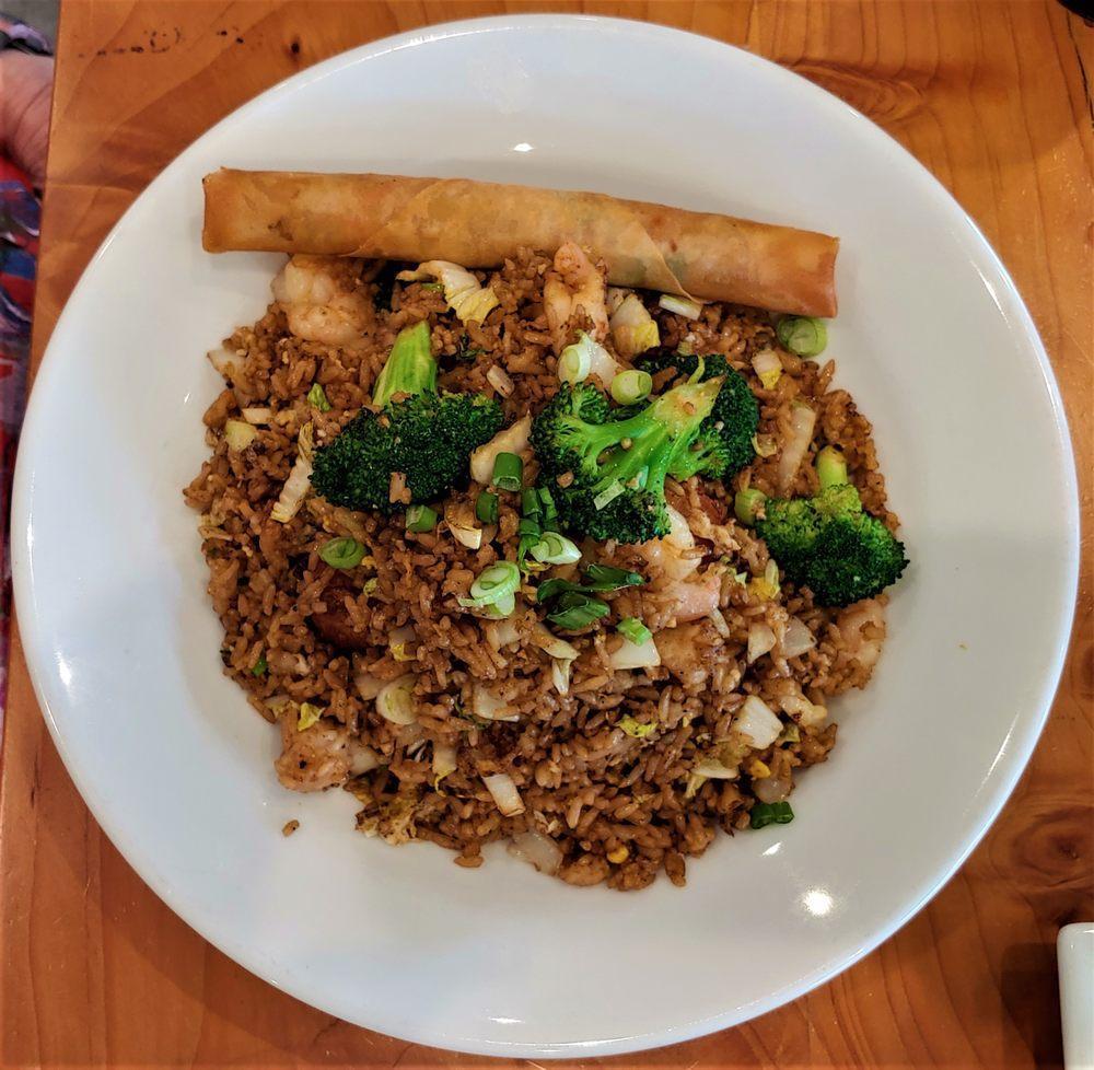 Seafood Lover's Fried Rice · Shrimp and large sea scallops with egg, nappa cabbage, broccoli, topped with scallions served with a veggie spring roll.
