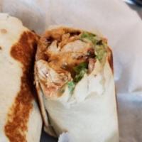 Chicken Kabob Sandwich · Char-broiled marinated chicken breast cubes served on a toasted wrap or fluffy pita + hummus...