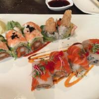 Happy Match Roll · Raw. In: shrimp tempura, spicy salmon. Top: shrimp, avocado and spicy peanut sauce.