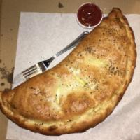 Big Ass Calzone · Stuffed with Ricotta and Mozzarella Cheeses. Make it your own with customizable Topping Stuf...