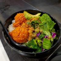 Spicy Tuna Bowl · Spicy tuna, mixed greens, fried onion, sesame, and guacamole over rice.