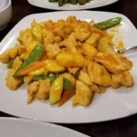 Mango Chicken · Sauteed chicken with shredded mango, onion, red and green pepper in spicy and sweet sour sau...