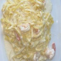 Fettuccine Alfredo · Sauteed shrimp and Parmesan cream sauce.