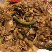 Pad Kee Mao · Drunken noodles. Meat or tofu is stir-fried with wide rice noodles, garlic, egg, red bell pe...