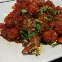 Kopi Pakora · Cauliflower florets dipped in corn starch batter; mixed with soy sauce, peeled tomato and ch...